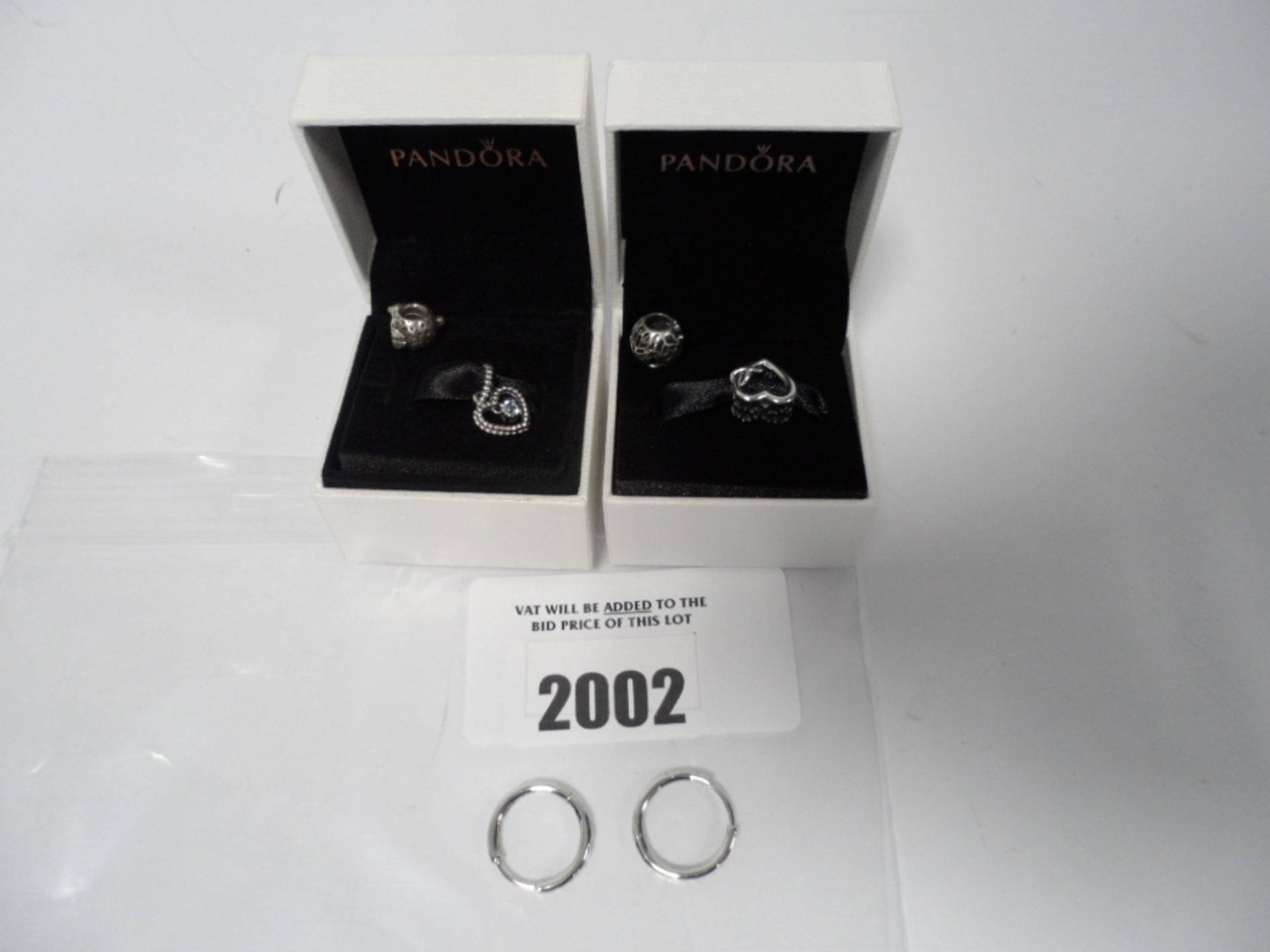 Pandora jewellery items 2 boxed charms and 2 loose charms with earrings.