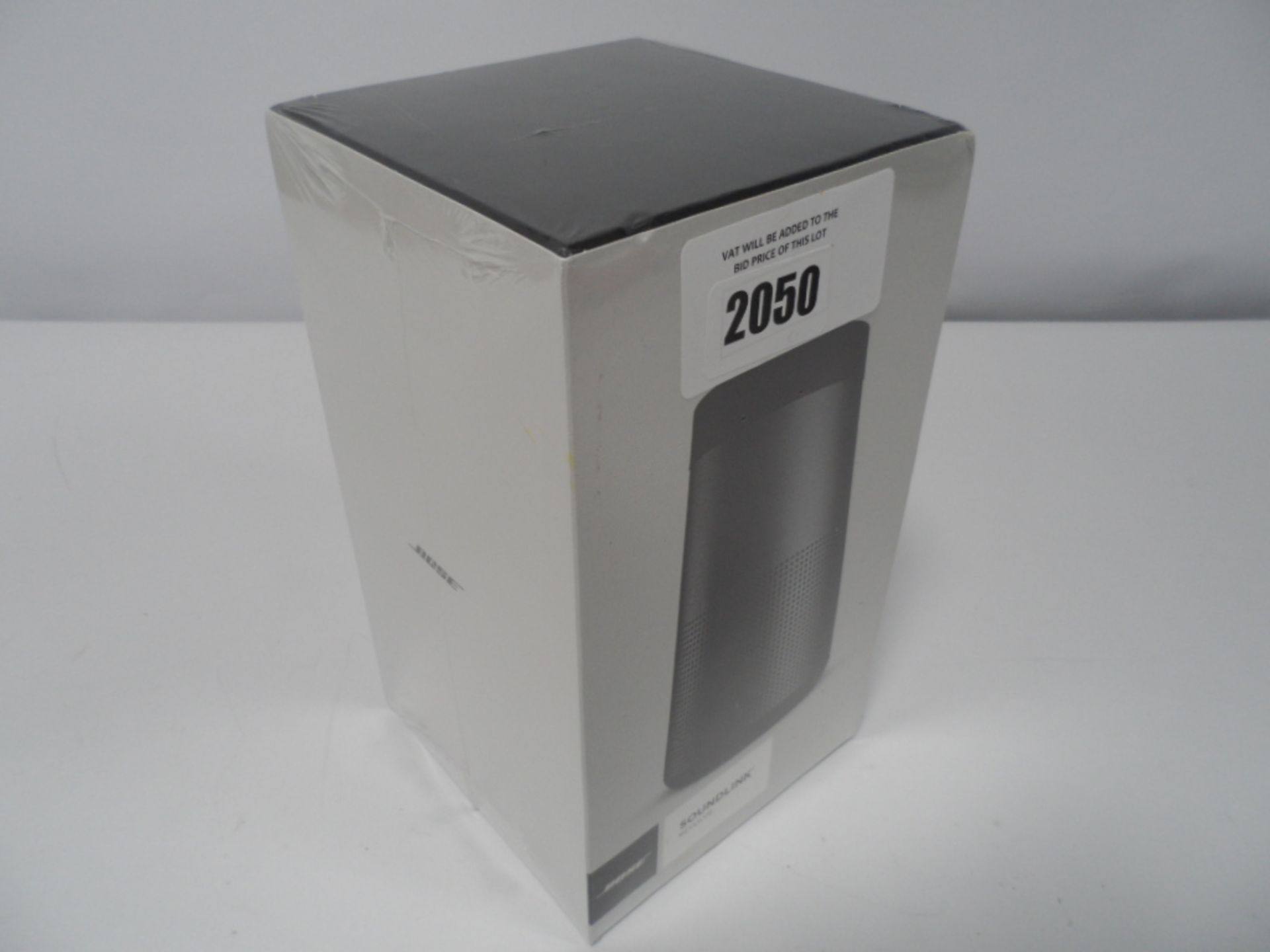 Bose soundlink Revolve speaker in sealed box.