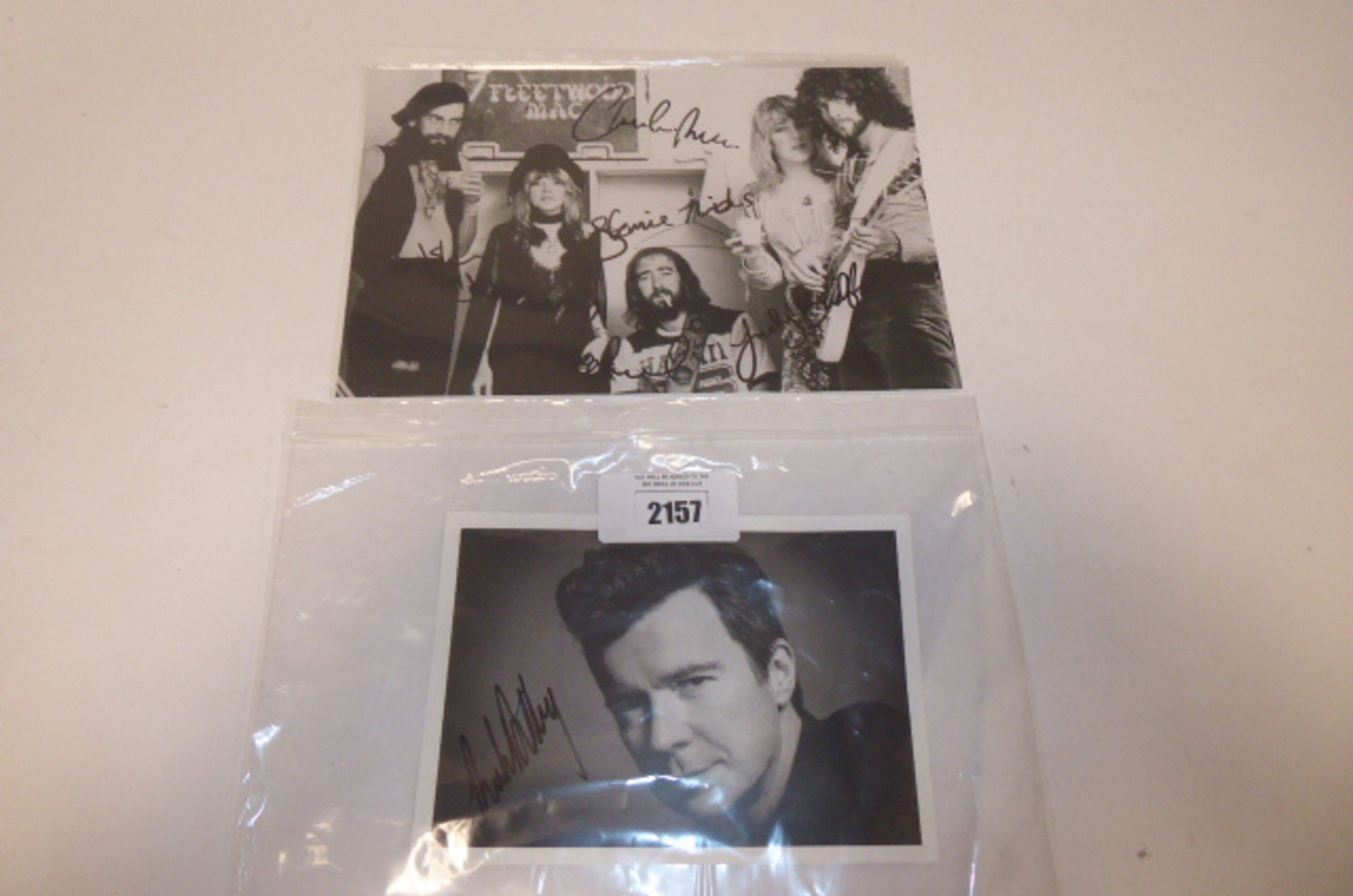 Singed Black and White Photo's of Fleetwood Mac and Rick Astley ( unverified)