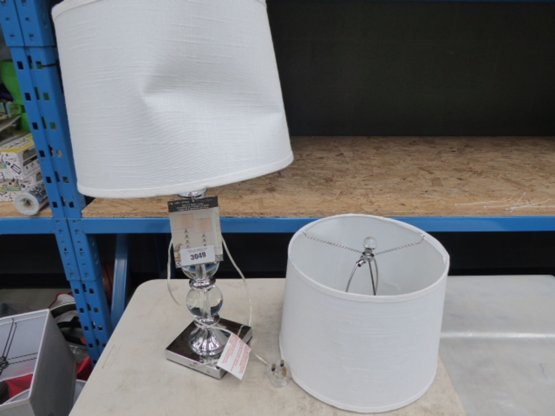 Bridge design table lamp with white shade plus another lampshade