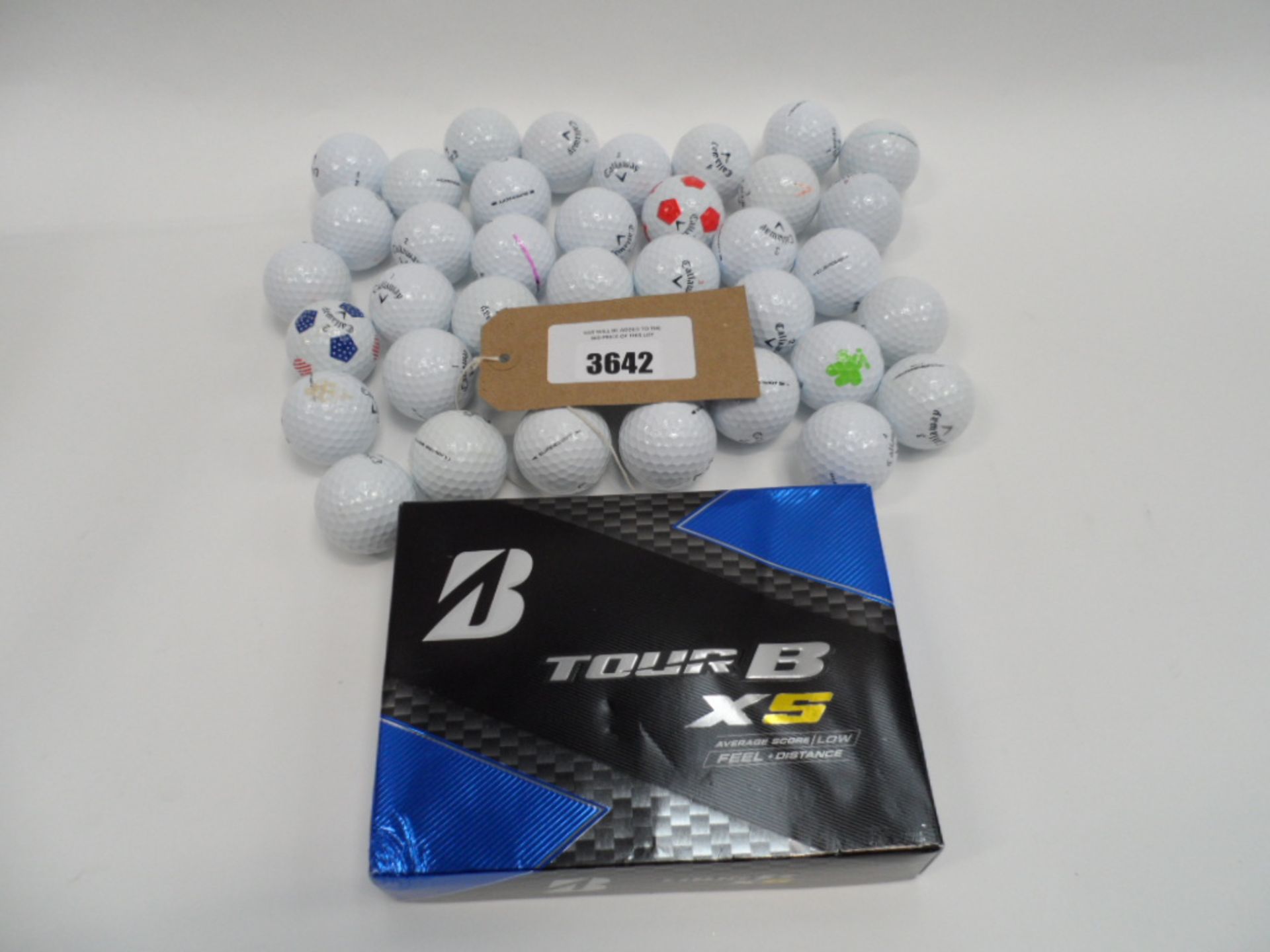 Set of 12 Tour B XS golf balls and various loose Callaway golf balls