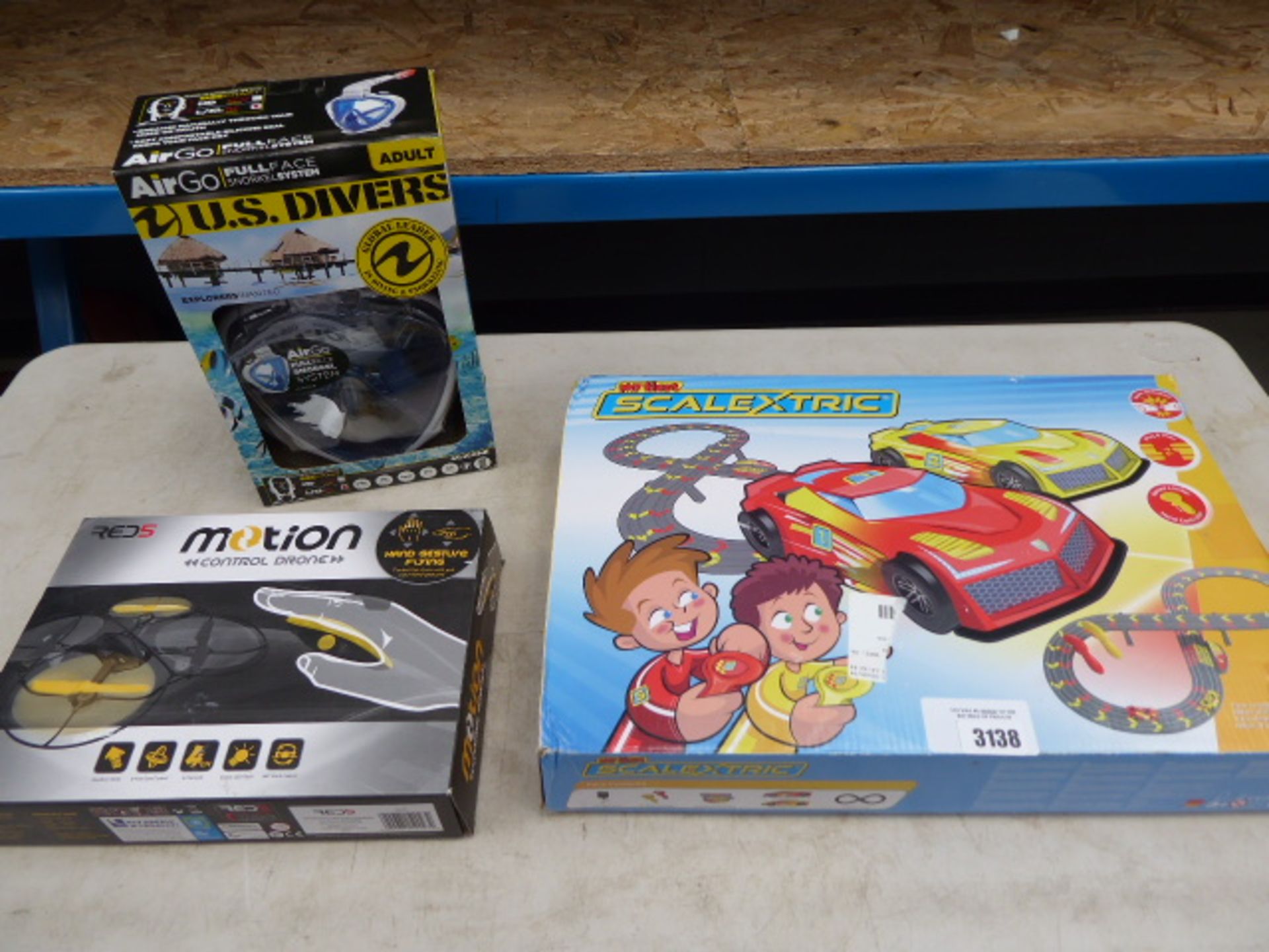 Micro Scalextric set, US divers snorkel mask and motion control drone