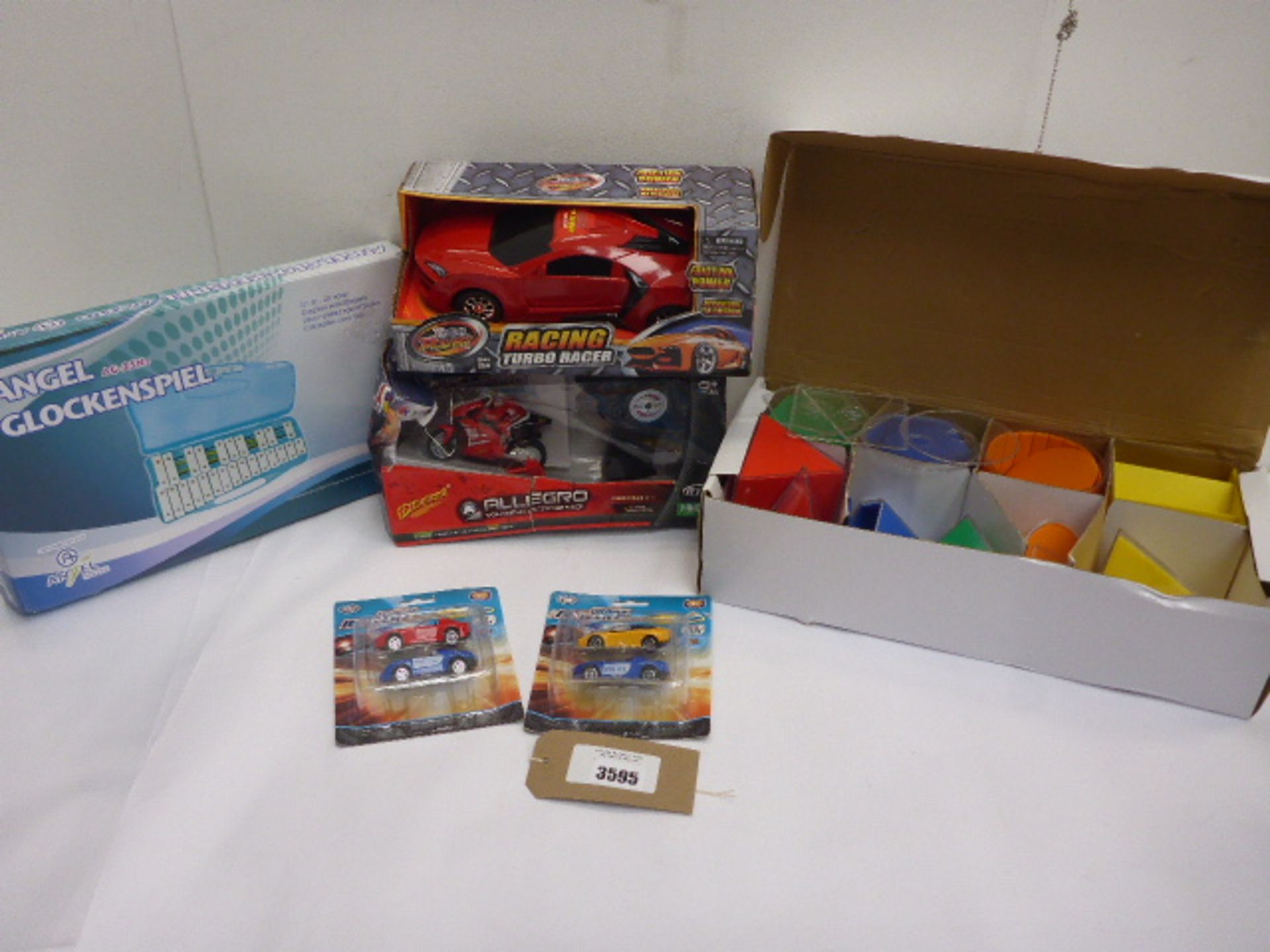 Angel Glockenspiel, r/c bike, Racing turbo car, Urban Blazer model cars and colour and shape game
