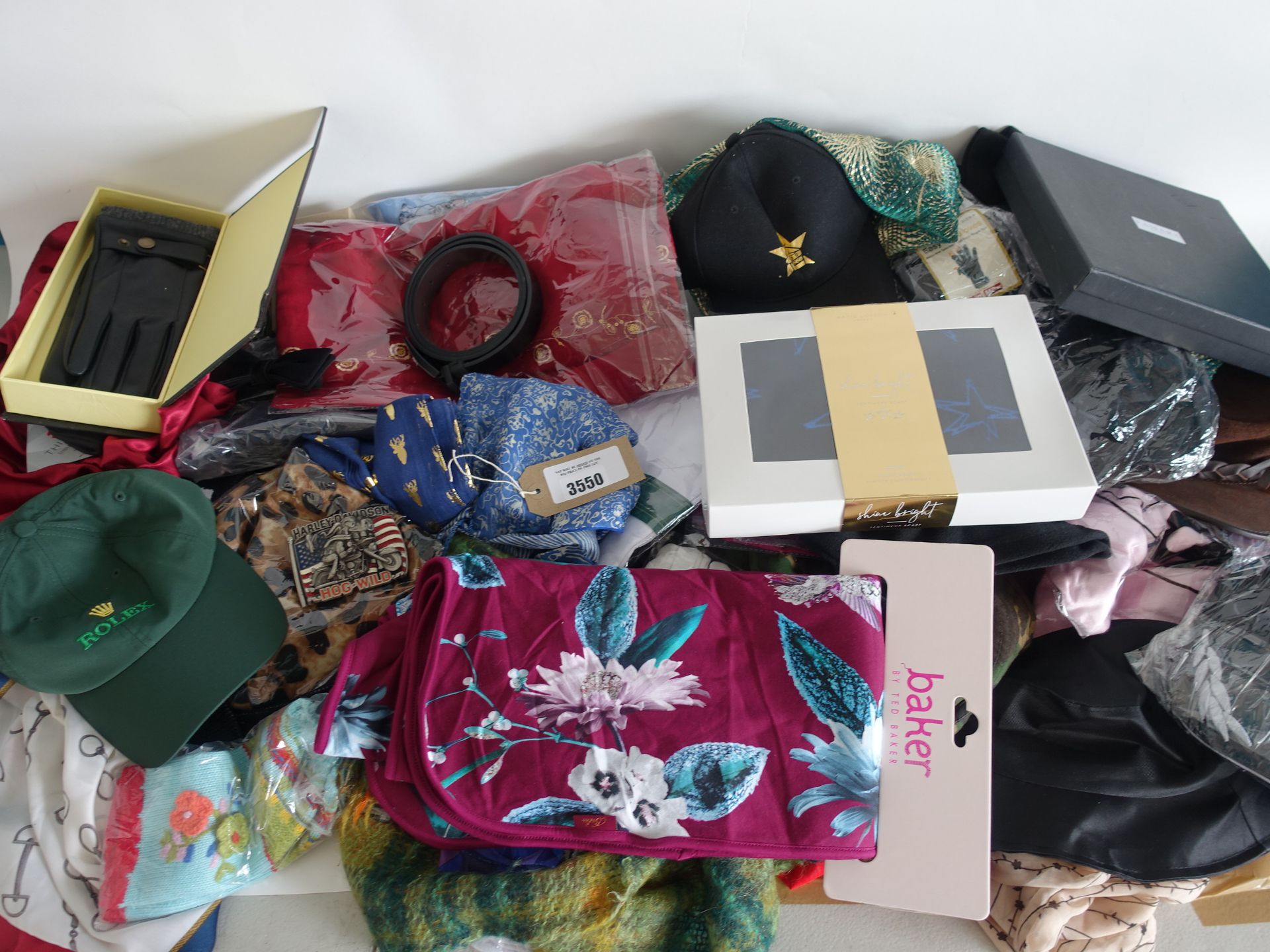 Large bag containing accessories including hats, scarves, gloves and belts