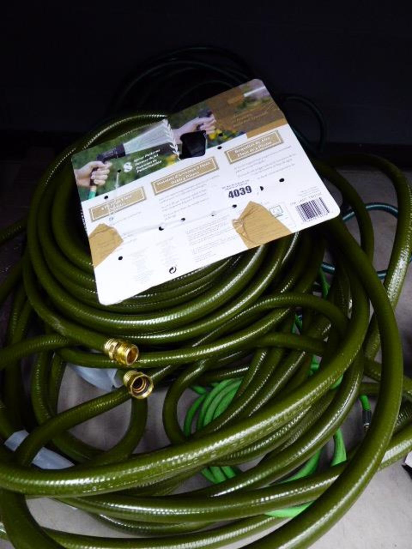 Quantity of heavy duty green garden hose