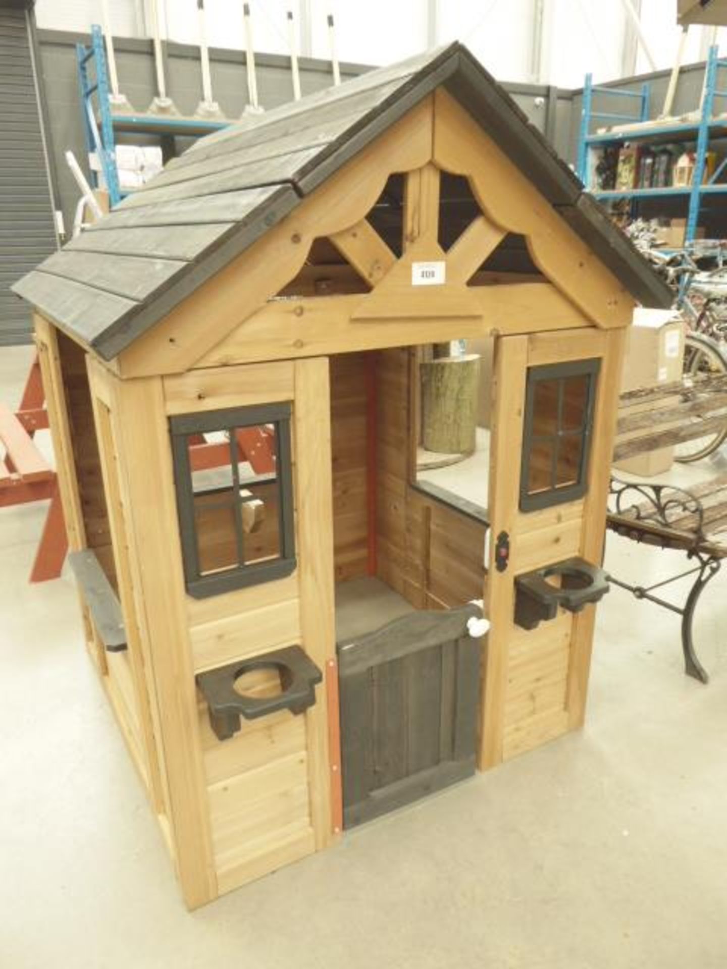 Wooden child's playhouse