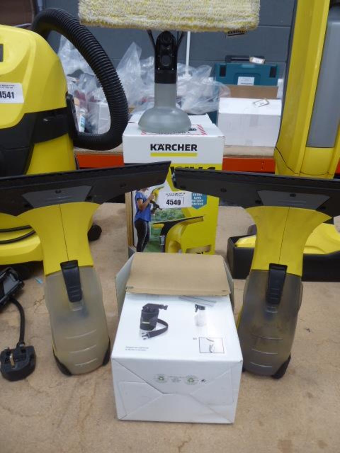 2 boxed and 2 unboxed Karcher window vacs