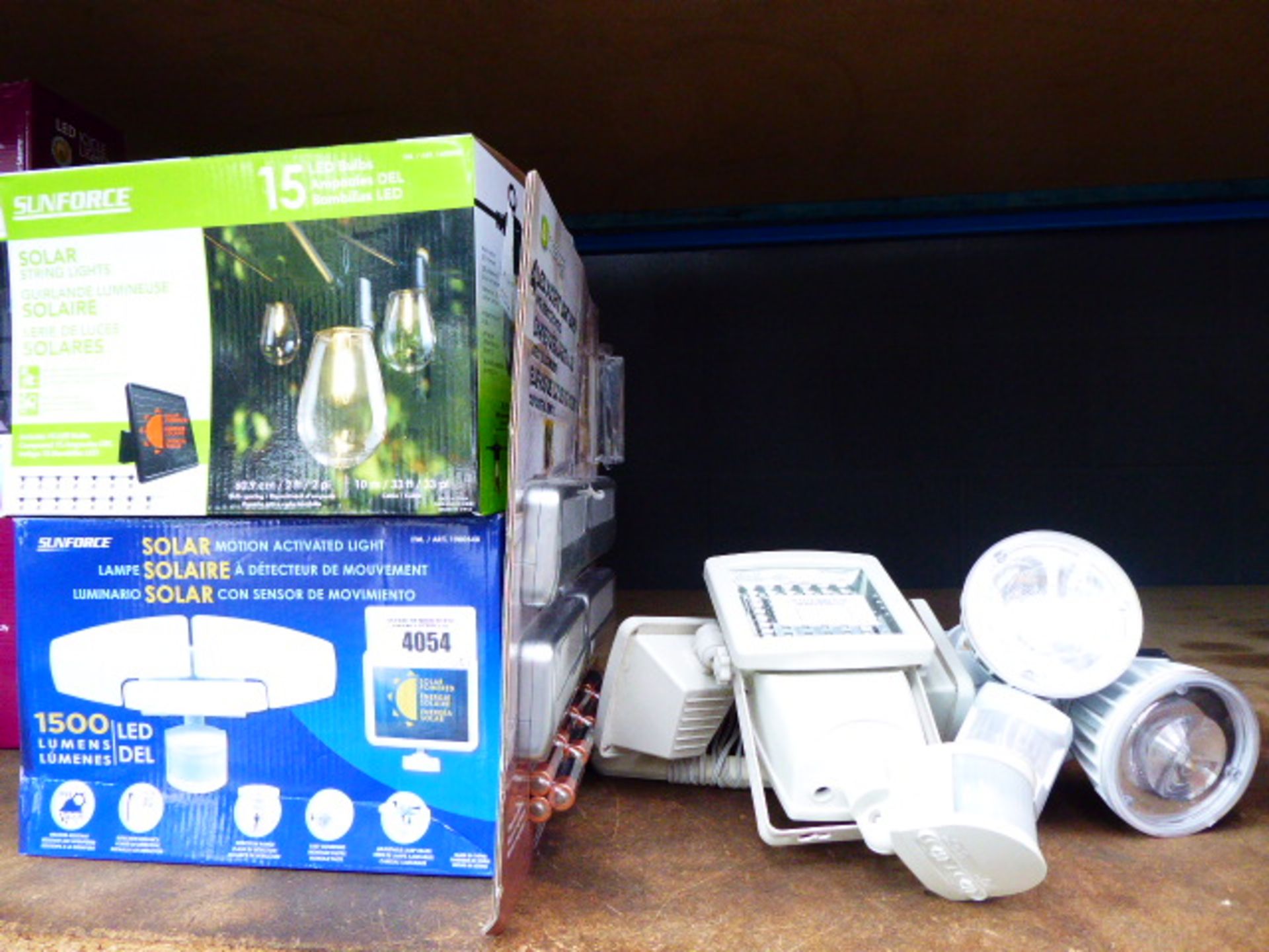 Sunforce solar motion light, box of string lights,