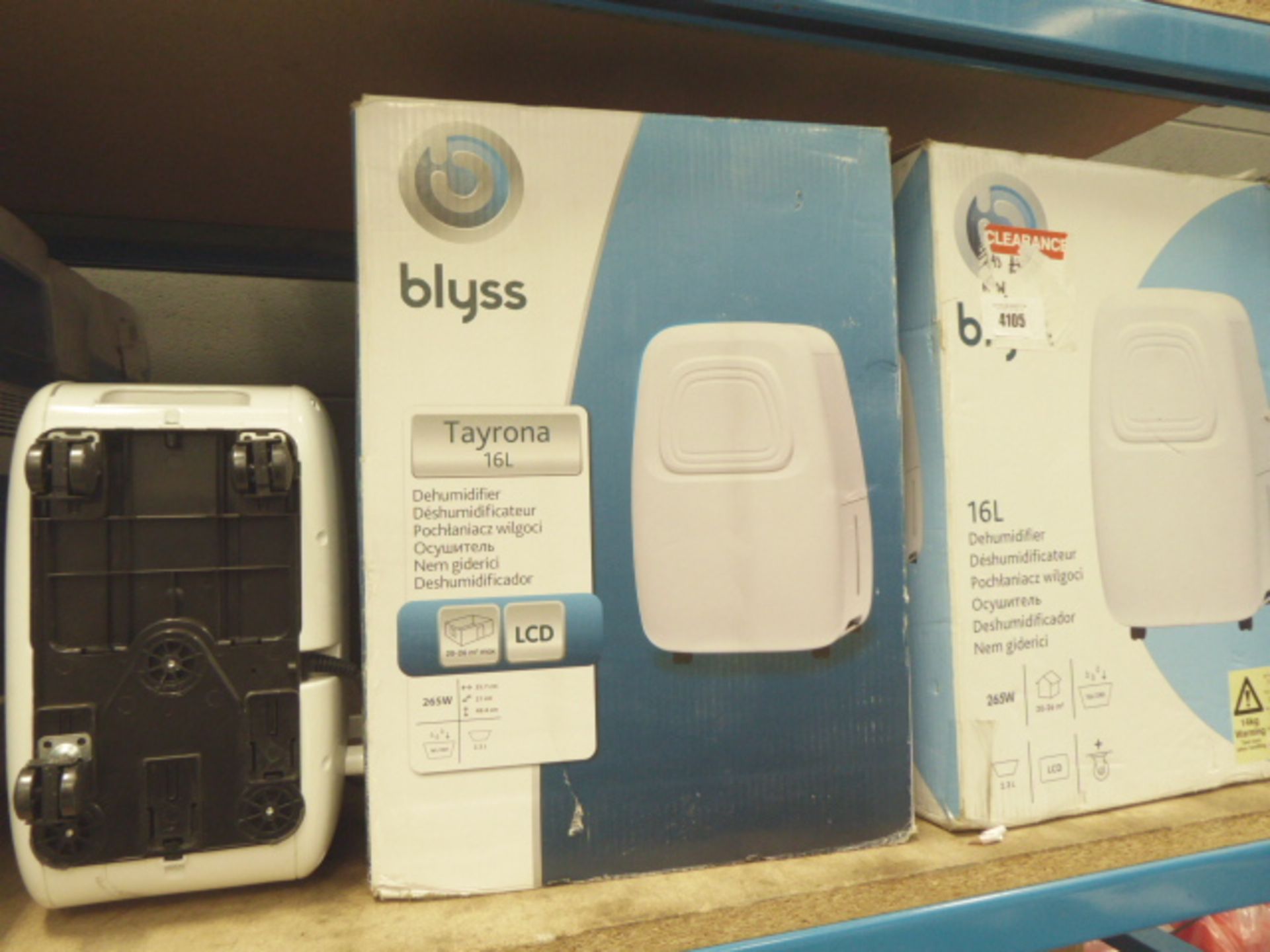 2 boxed Blyss dehumidifiers and one unboxed