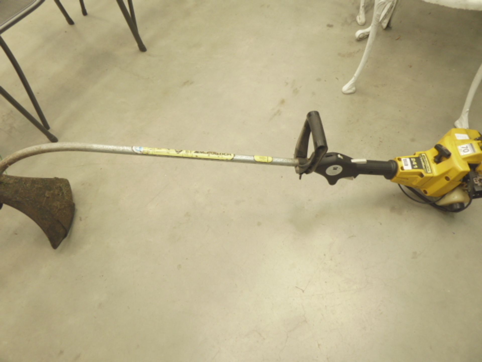 MacCulloch petrol powered bent shaft strimmer