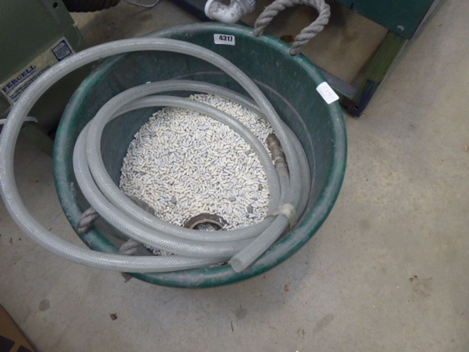 Bucket of ceramic polishing beads