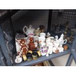 A cage of napkin rings, commemorative mugs, crestedware, china and figures etc.