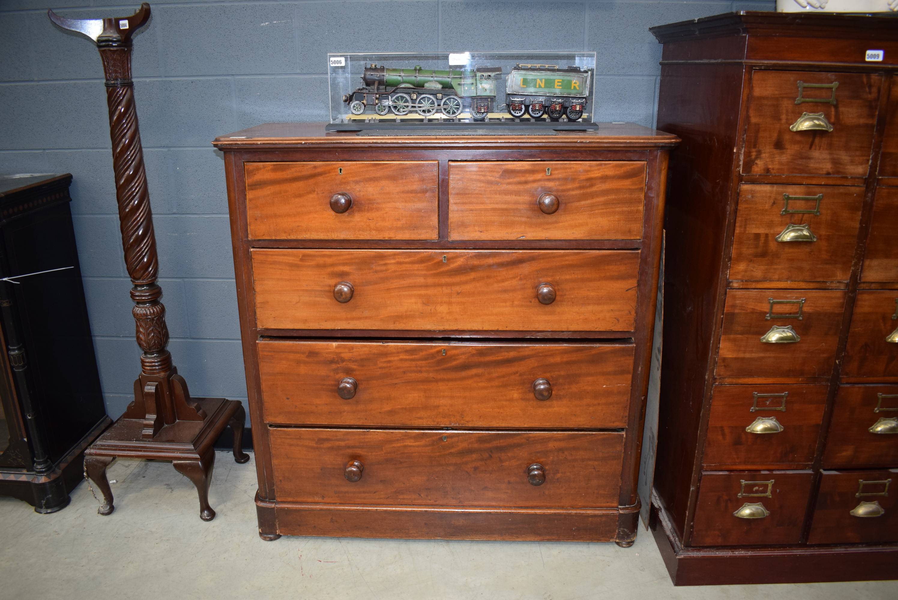 A Victorian mahogany chest of drawers two over three