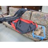 A Daiwa canvas rod bag and a car seat cover