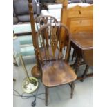 Pair of elm seated wheel back dining chairs