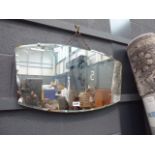 A 1950's bevelled wall mirror