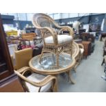 Bent cane conservatory table with 4 chairs and lamp table