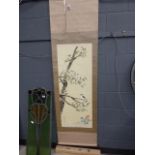 5163 A modern Japanese scroll painted with a song bird on a blossoming branch, signed,