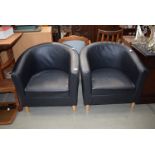 Two modern black tub chairs