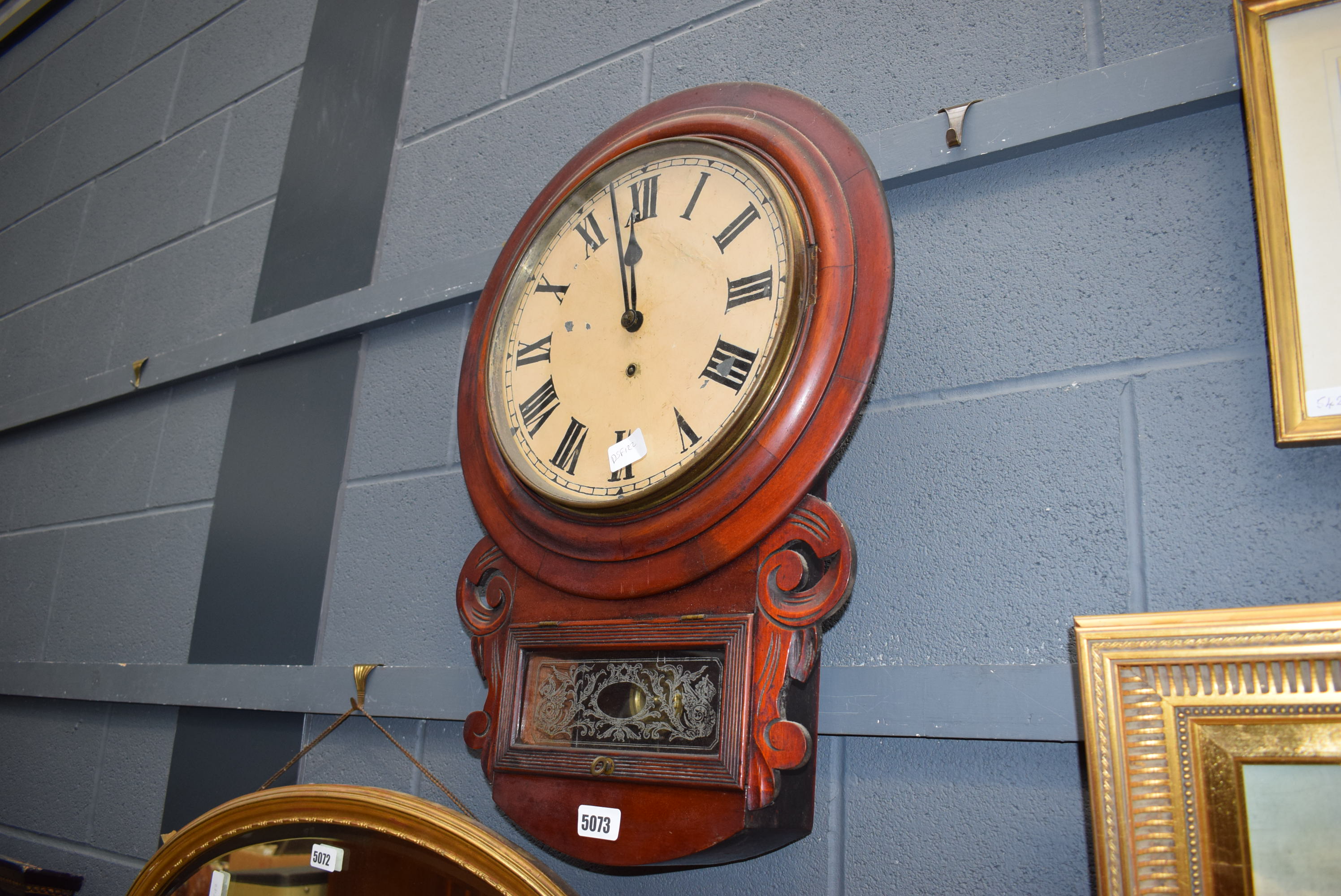 An American-style drop dial wall clock