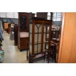 An Edwardian mahogany and inlaid glazed display cabinet