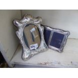 Two silver photograph frames