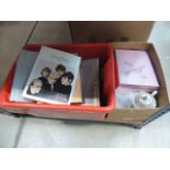 Two boxes containing vintage ladies stockings, costume jewellery, Victoria china etc.