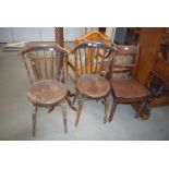 A pair of round seated kitchen chairs and a Victorian elm seated kitchen chair