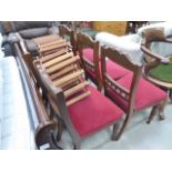 6 carved and red upholstered Edwardian dining chairs