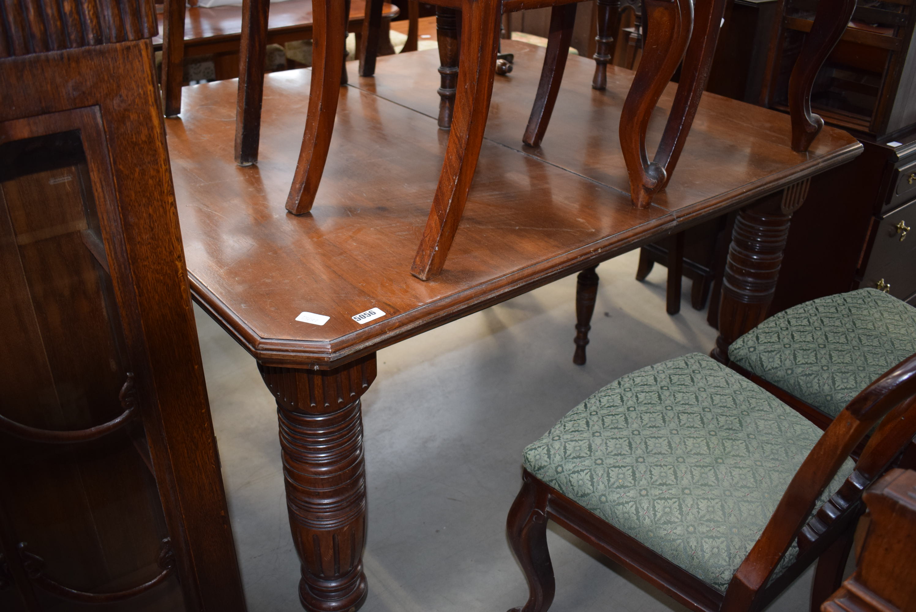 A late 19th/early 20th century walnut dining table