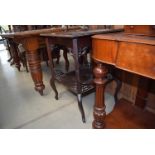 A Victorian mahogany two tier side table in the manner of Chippendale