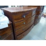 A Victorian mahogany bow fronted chest of two over three drawers