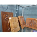 Five carved panels with sailing ships and horses