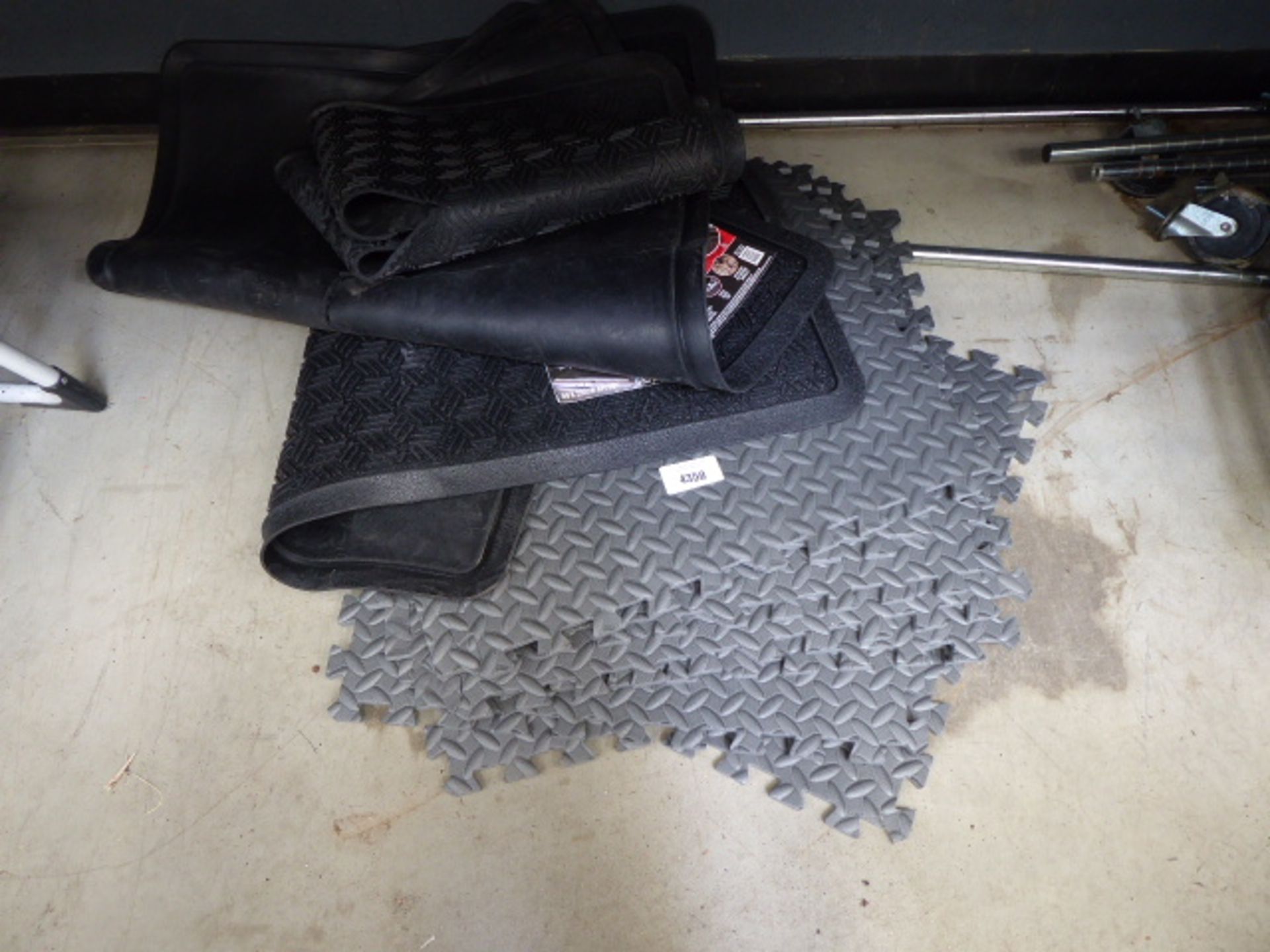 Quantity of click together matting and rubber mats