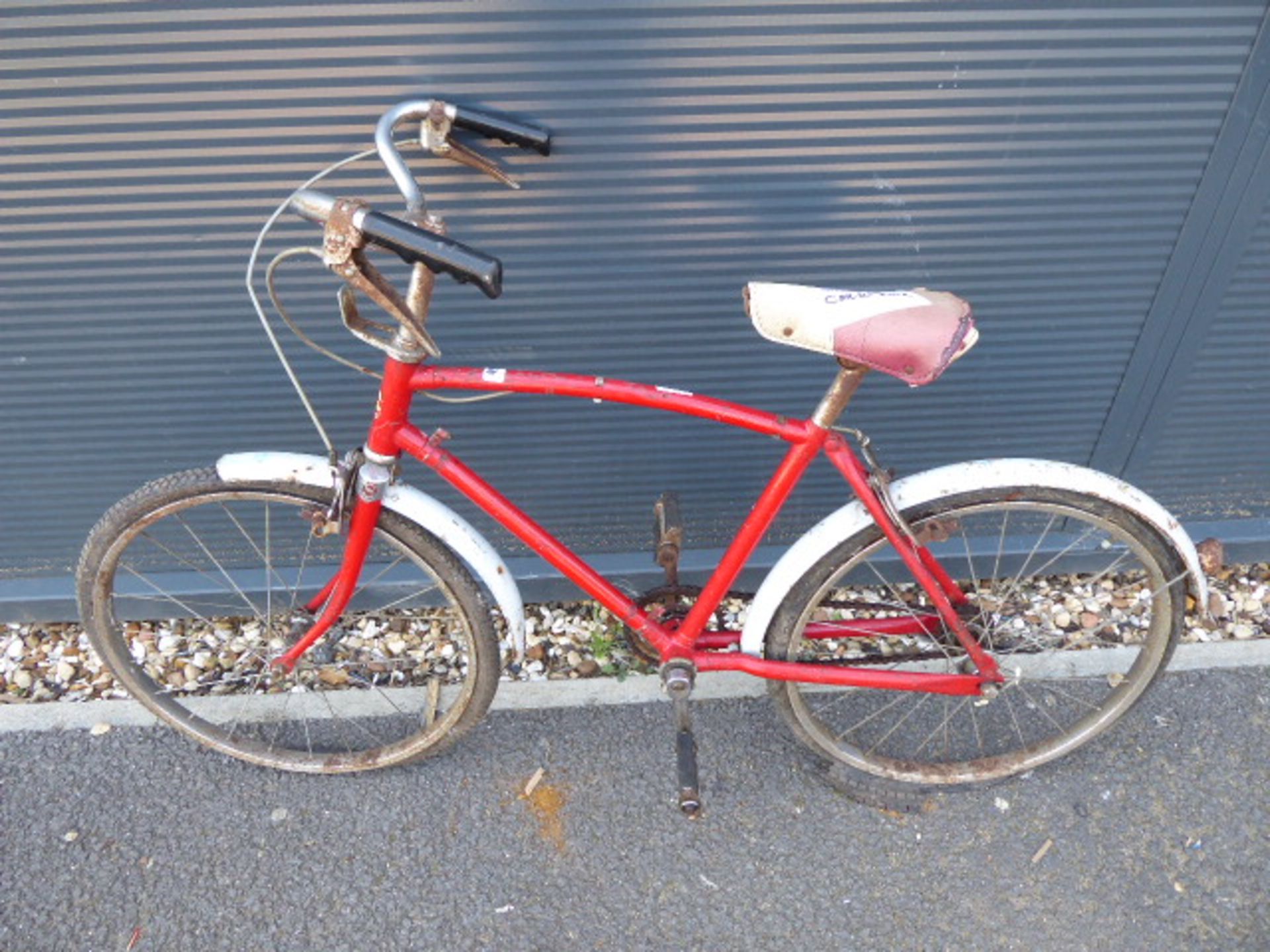 Small child's red and grey cycle