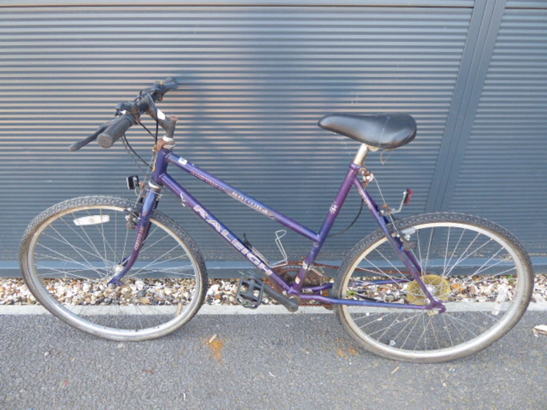 Purple Raleigh ladies cycle