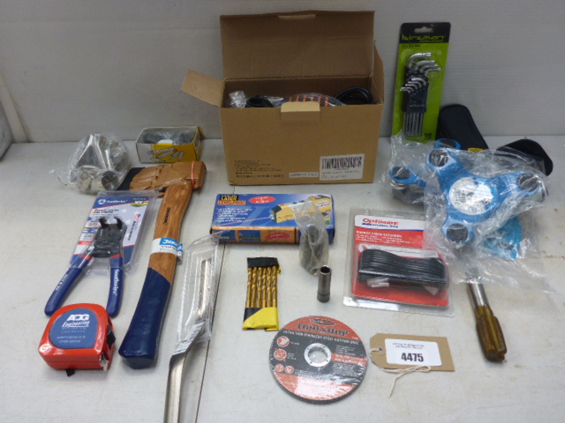 4475- Bag containing Tacklife palm sander, small hatchet, drill bits, wheel moving dollies,