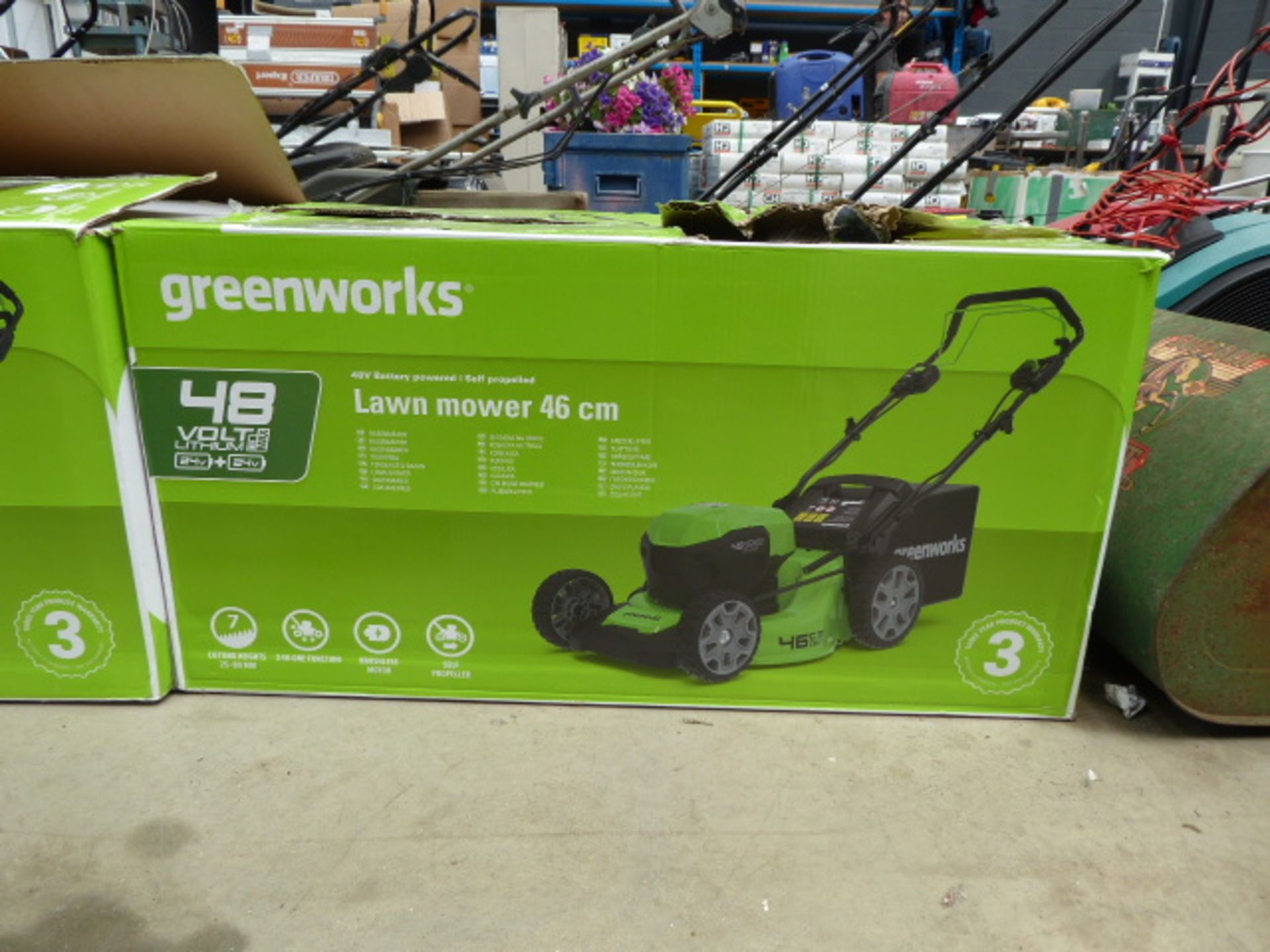 Boxed Greenworks battery powered mower with 2 batteries and charger