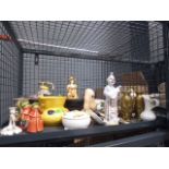 Cage containing ornamental figures, loose cutlery,