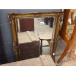 Rectangular bevelled mirror in gilt frame