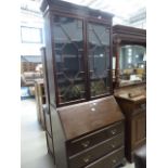 Edwardian bureau bookcase with a qty of novels