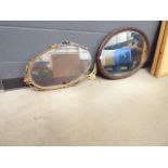 Oval bevelled mirror in oak frame