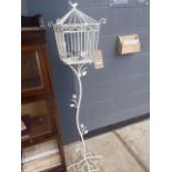 Cream painted metal bird cage