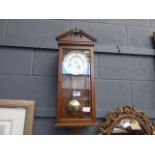 Oak cased wall clock