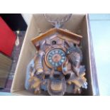 Box containing cuckoo clock