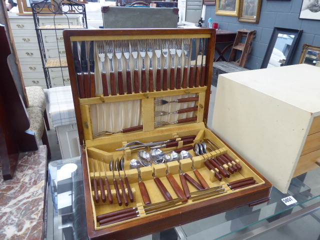 Cased cutlery set with teak handles