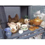 Cage containing pressed commemorative glass plus commemorative mugs and an egg basket