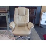 Coffee and cream coloured swivel office armchair