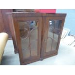 Walnut and oak glazed double door cabinet