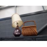 Glass table lamp plus a wicker basket